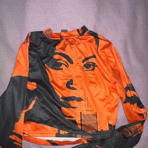Orange and Black Graphic Long Sleeve Top